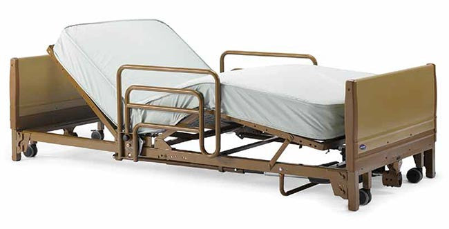 Invacare's IVC Full-Electric Low Bed 5410LOW Bed shown with optional half rails and mattress.
