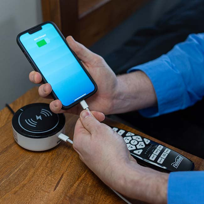 Best Hospital Bed for Elderly Care at Home - Flexabed offers an optional Bedside Voice Control device that features Wired and Wireless Charging for your smart phone.